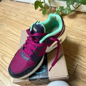 Nike Sneakers with Purple and Teal Accents